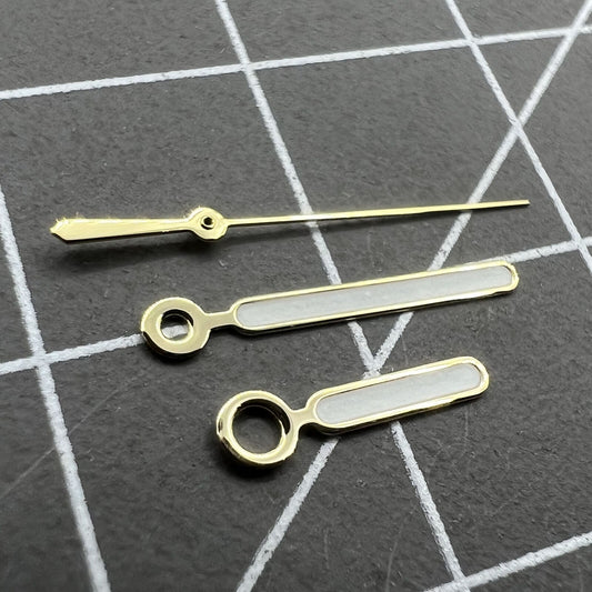 Aiguilles de montre luminescentes vertes peintes en blanc avec garniture dorée de 12,5 mm pour NH35 NH36 7S26 7S36