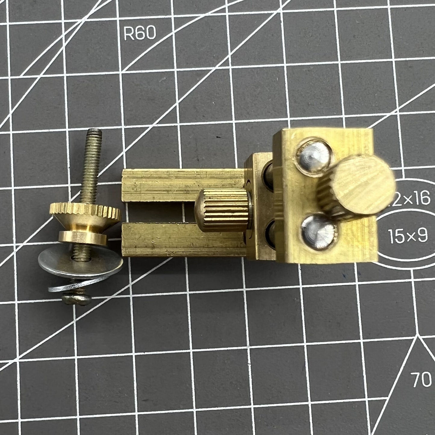 Auxiliary positioning tool for accurate watch stem cutting with cutter plier accessory.