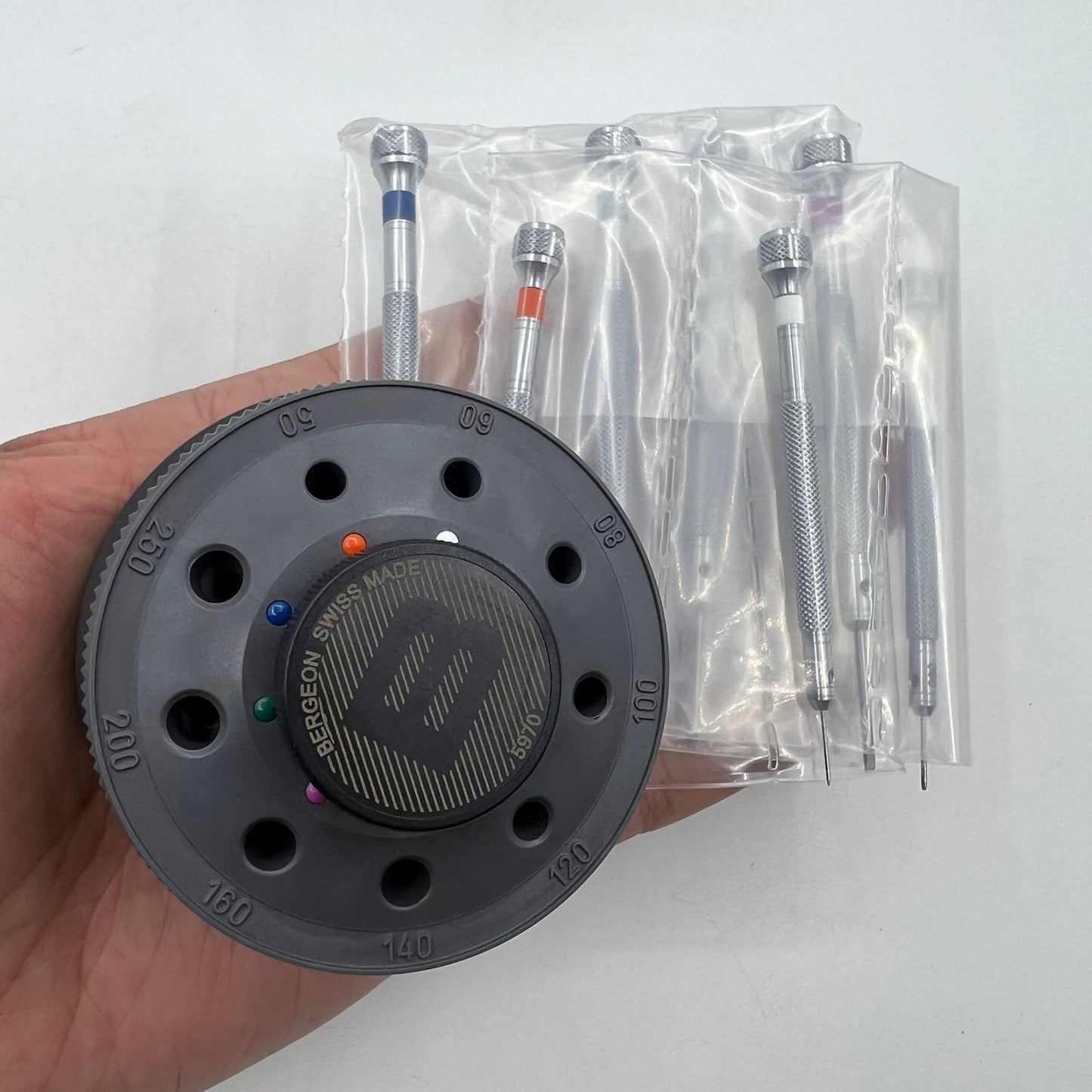 Bergeon 5970 rotating tool set with 9 precision screwdrivers for watch repair, Swiss made quality.