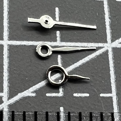 Silver watch hands set for Miyota 2035 movement, 7mm/6mm/4mm lengths, precision fit accessory.