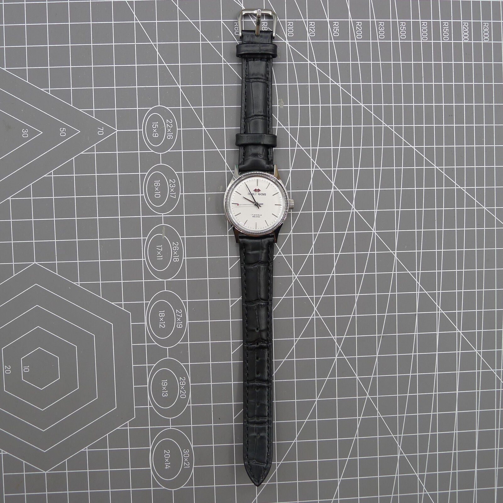 Silver 31mm Beijing Double Rhomb manual mechanical watch with three hands, elegant design by Beijing brand.