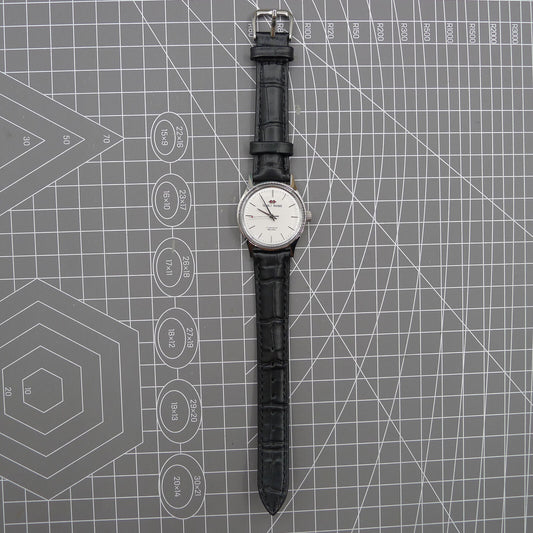 Silver 31mm Beijing Double Rhomb manual mechanical watch with three hands, elegant design by Beijing brand.