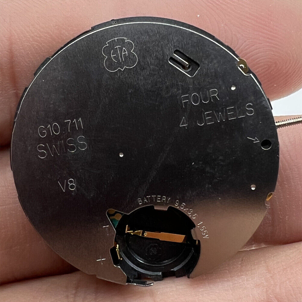 ETA G10.711 Swiss made quartz watch movement with 3 hands and date display, precise and reliable for repairs.