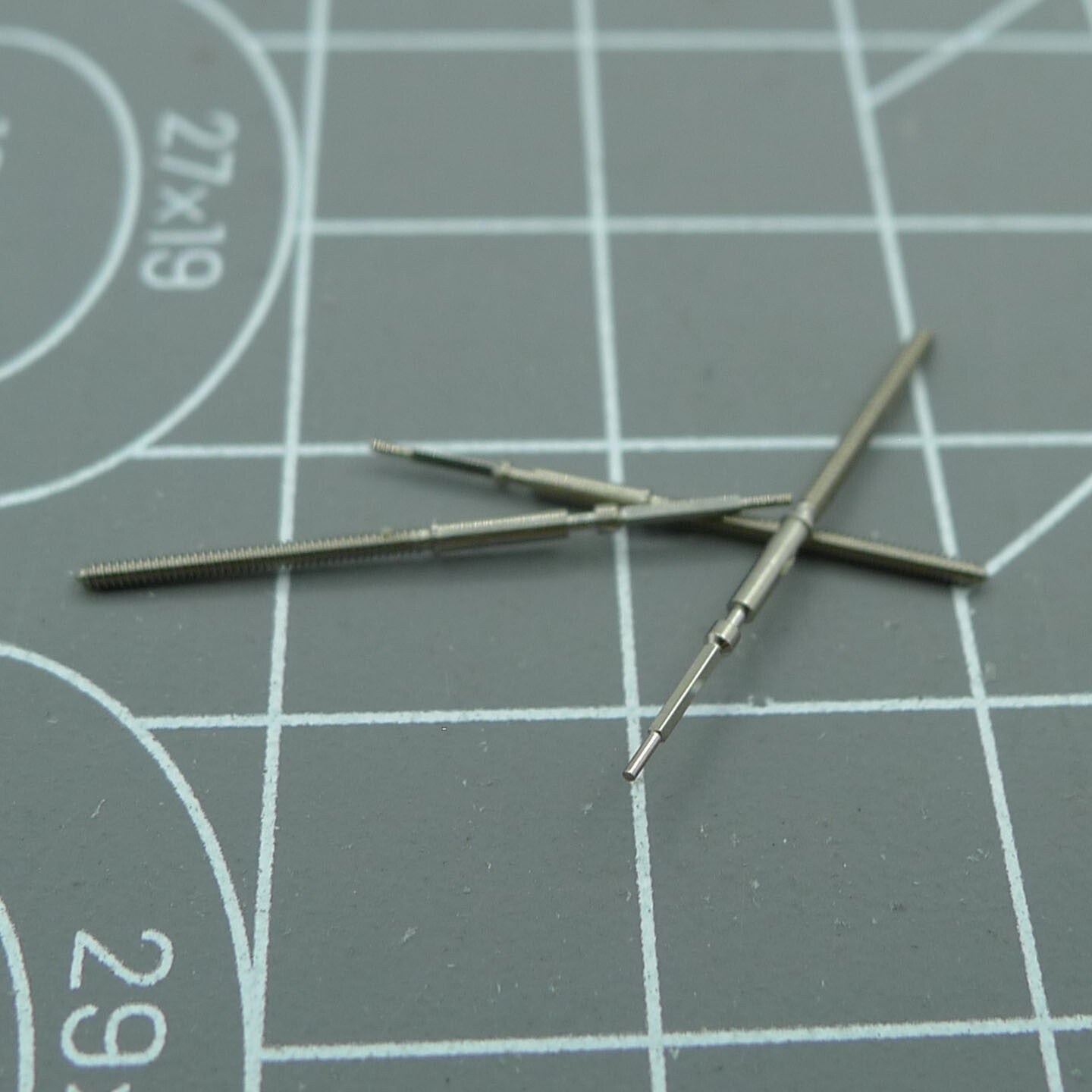 Precise watch winding stem for Ronda 6003D quartz movement, ideal for accurate time setting and winding.