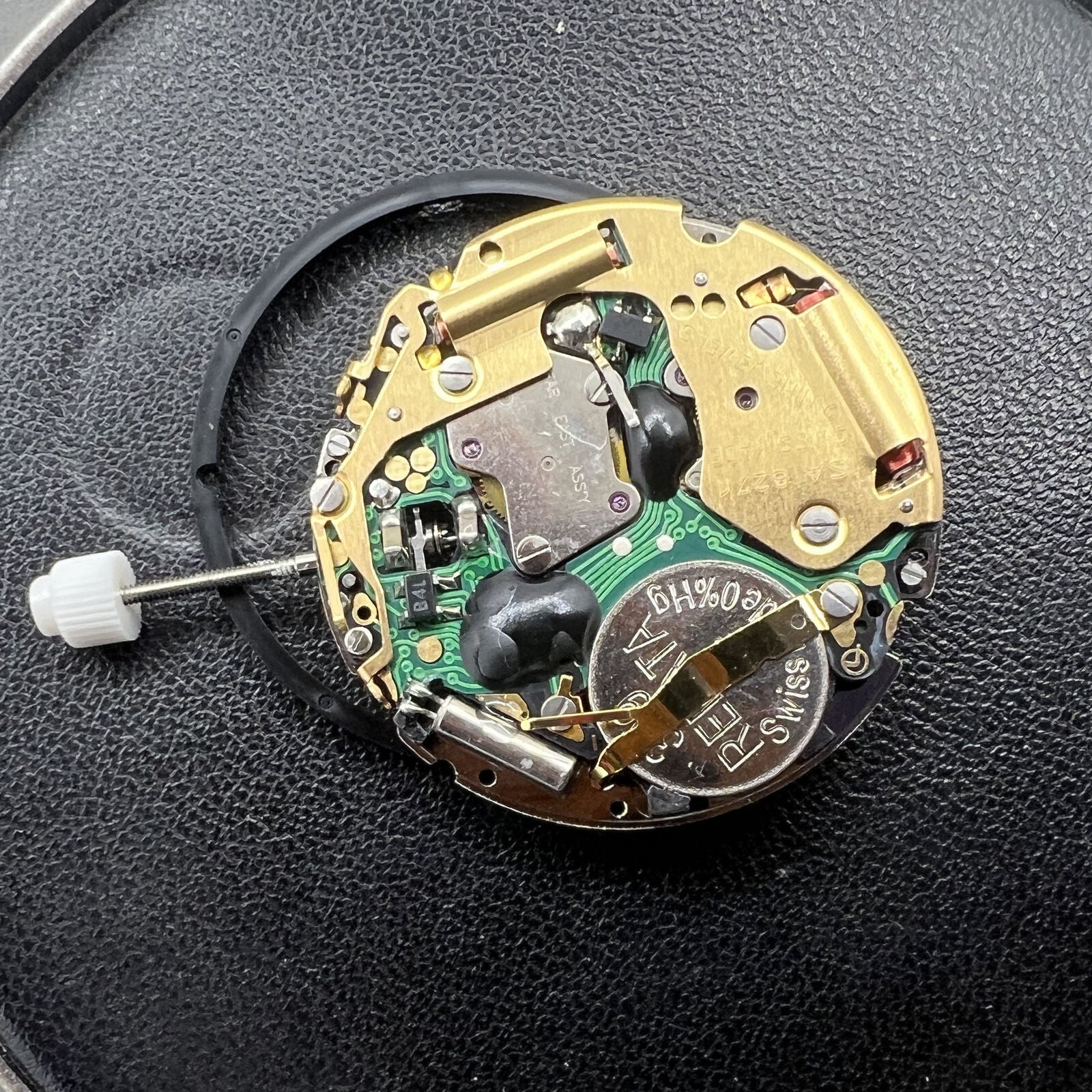 Golden ISA 8271 quartz watch with date at 6, multifunctional dial, and elegant gold-tone finish by ISA.