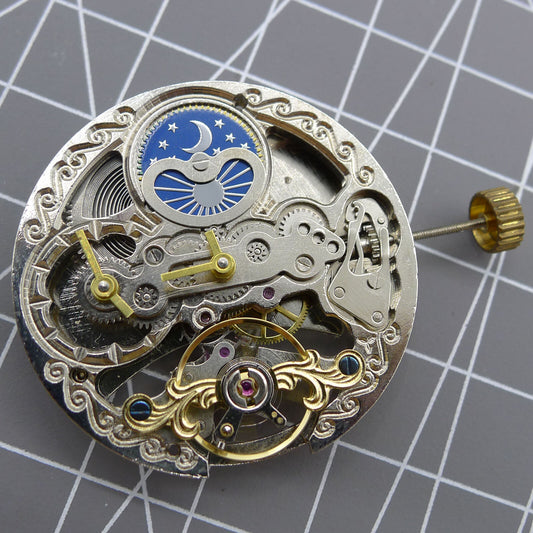 Automatic mechanical watch with silver 3 hands, hollow moon phase display at 12 o'clock.