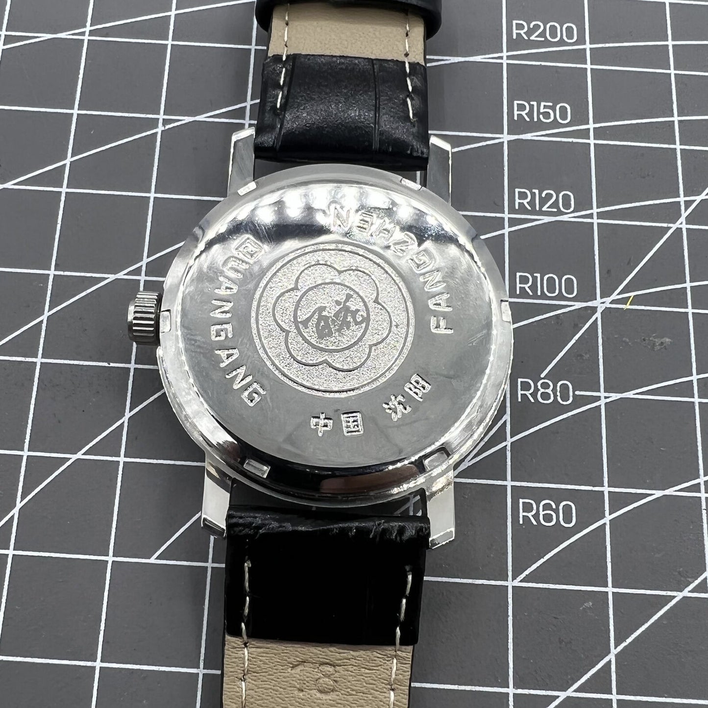 China Baihua 37mm manual mechanical watch with silver dial, 19 jewels, and shock-resistant design for lasting durability.