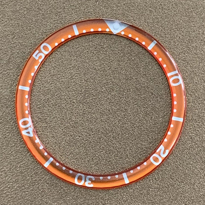 White font 39mm aluminum bezel insert with circular arc bevel for watch customization.