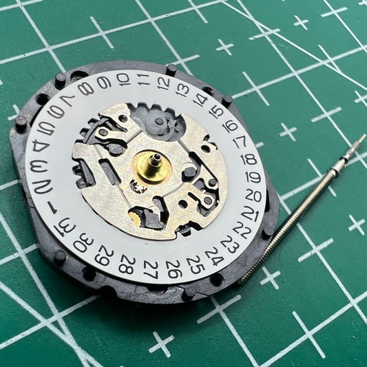 Hattori Epson TMI VX12 VX12E quartz watch movement with date display at 3 o'clock, reliable timekeeping