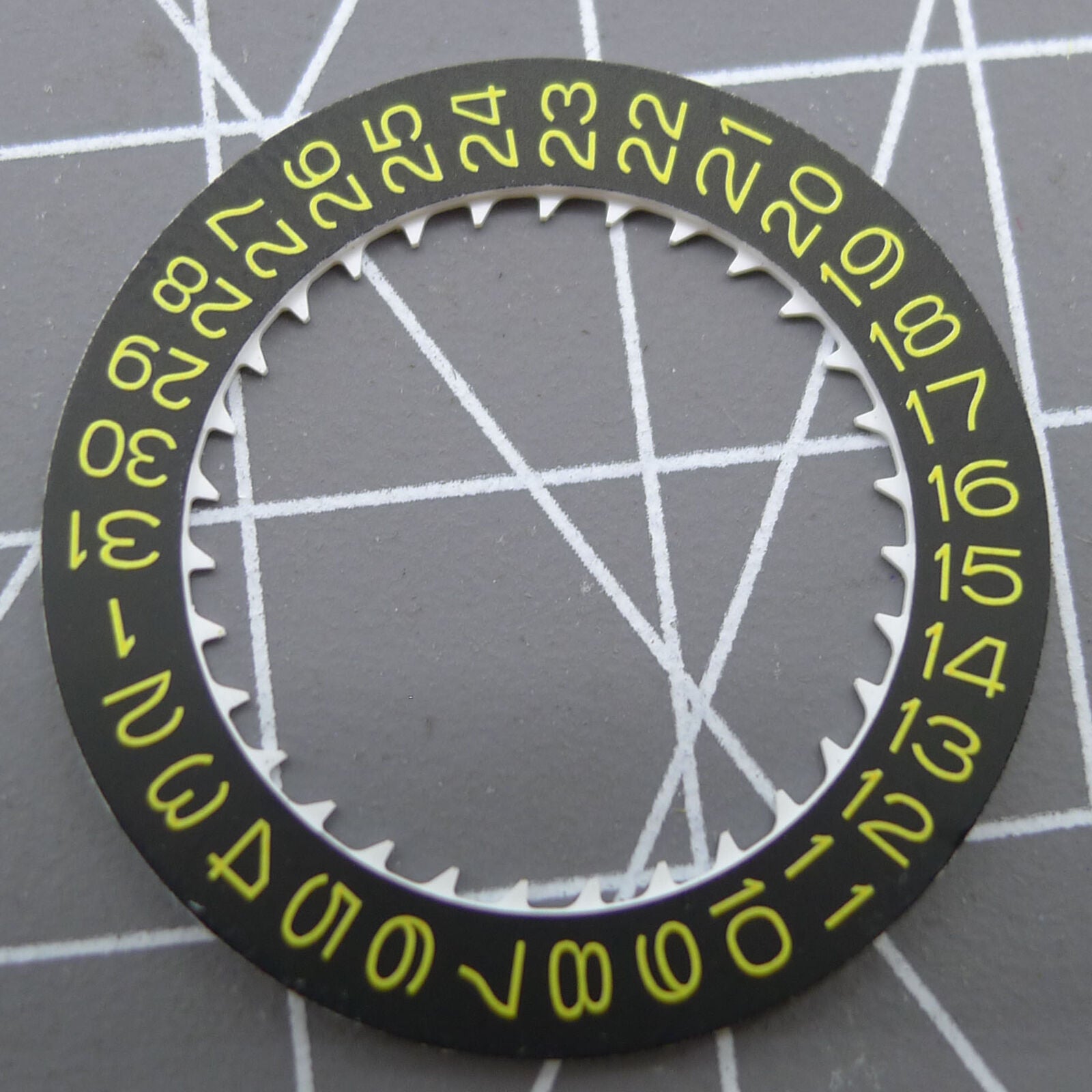Yellow font date disk wheel on black background for NH35 watch movement by Seiko.