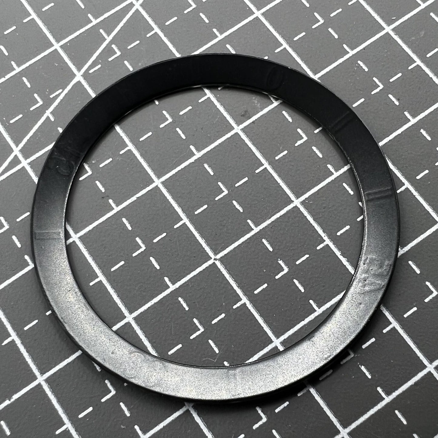 36mm black ceramic bezel insert with clear numerals for durable watch customization.