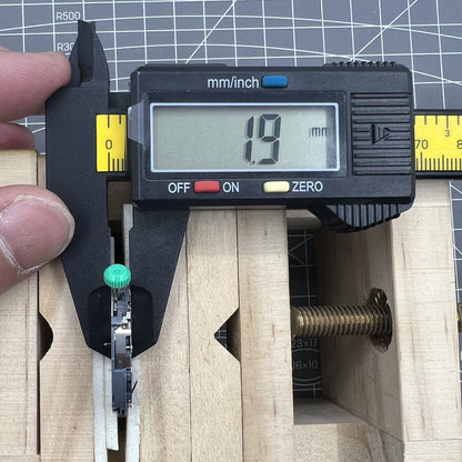 Miyota OS11 quartz watch movement by Citizen, precise and reliable timekeeping mechanism for watch repairs.