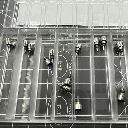 Set of 14 stainless steel watch pushers in 7 sizes, classic silver design for precise watch repair tasks.