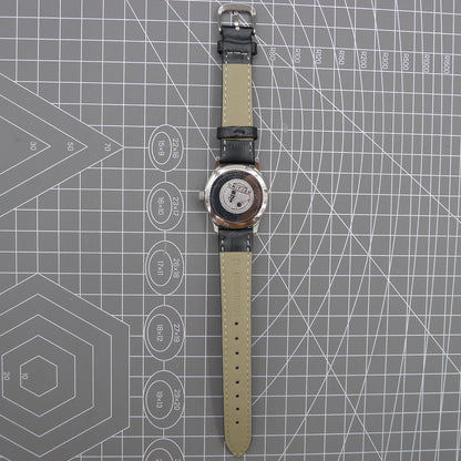 Beijing 31mm manual mechanical watch with silver case, double rhomb dial, showcasing classic Chinese craftsmanship.