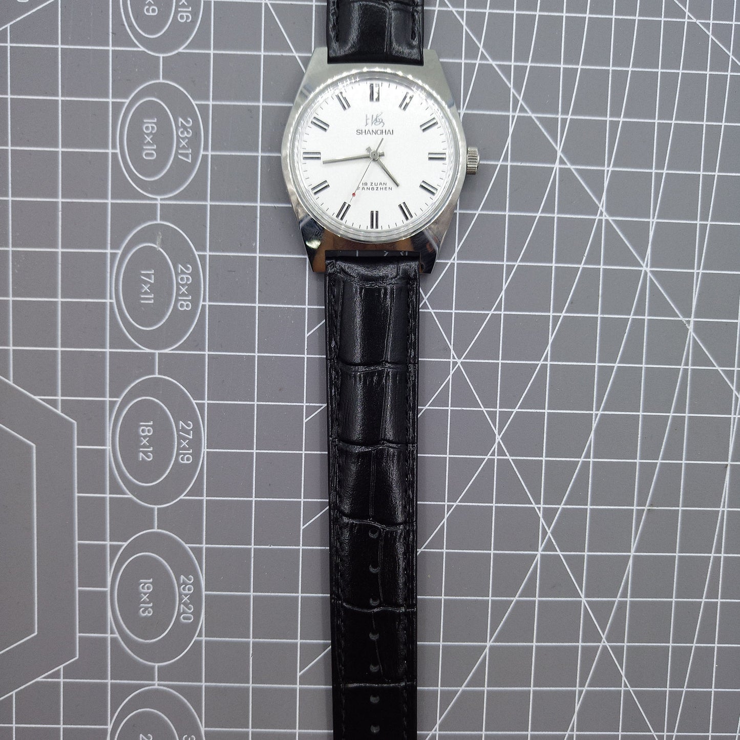 Shanghai Factory 38mm manual mechanical watch with white dial, 3 hands, 19 jewels, classic style for elegant wear.