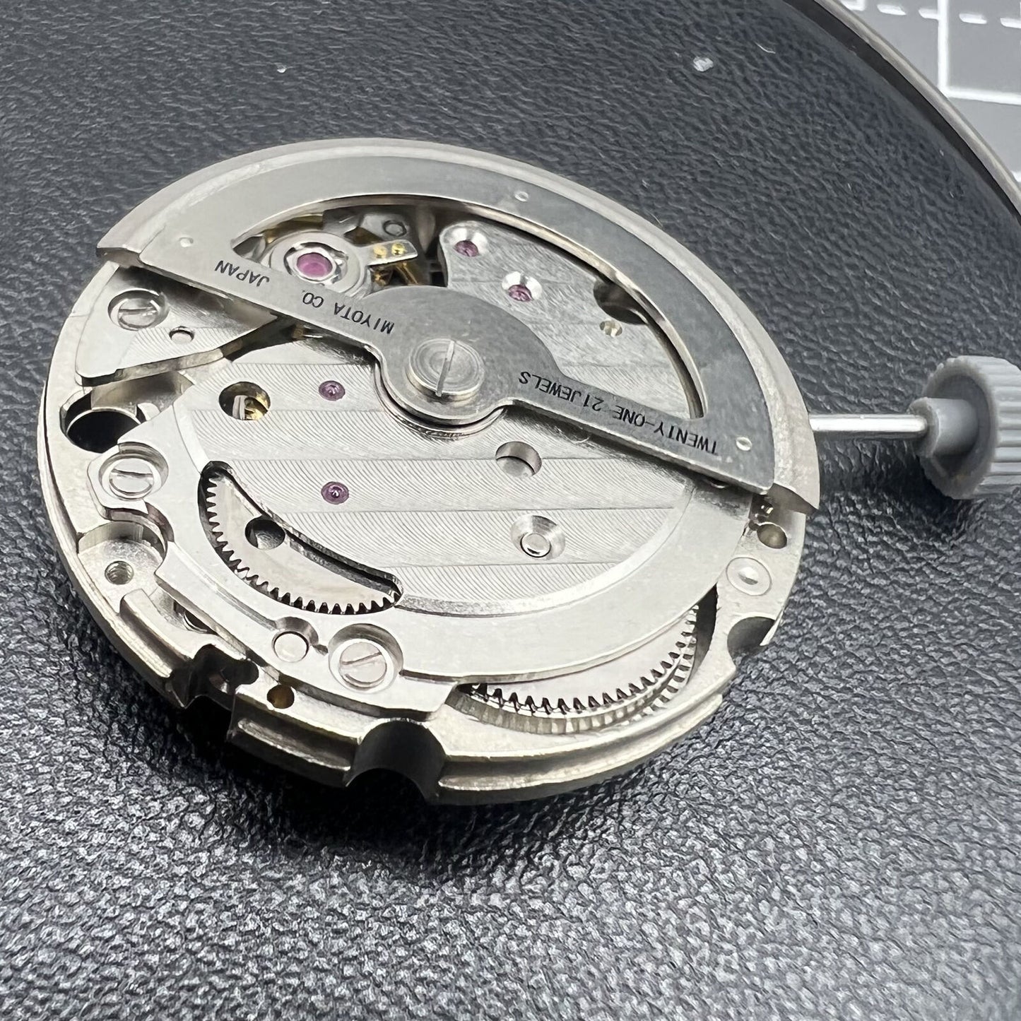 Miyota Citizen 82S5 silver plated automatic watch movement showcasing precise mechanical craftsmanship for reliable performance