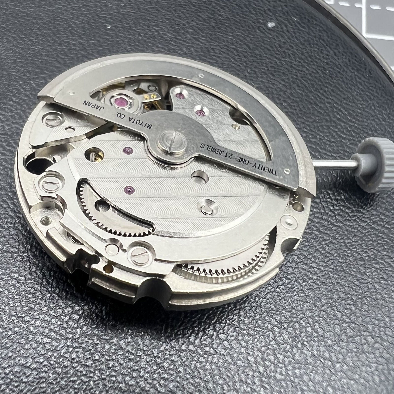 Miyota Citizen 82S5 silver plated automatic watch movement showcasing precise mechanical craftsmanship for reliable performance