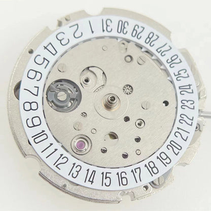 Miyota/Citizen 8215 watch movement with white dial and date at 6, precise automatic mechanical design.