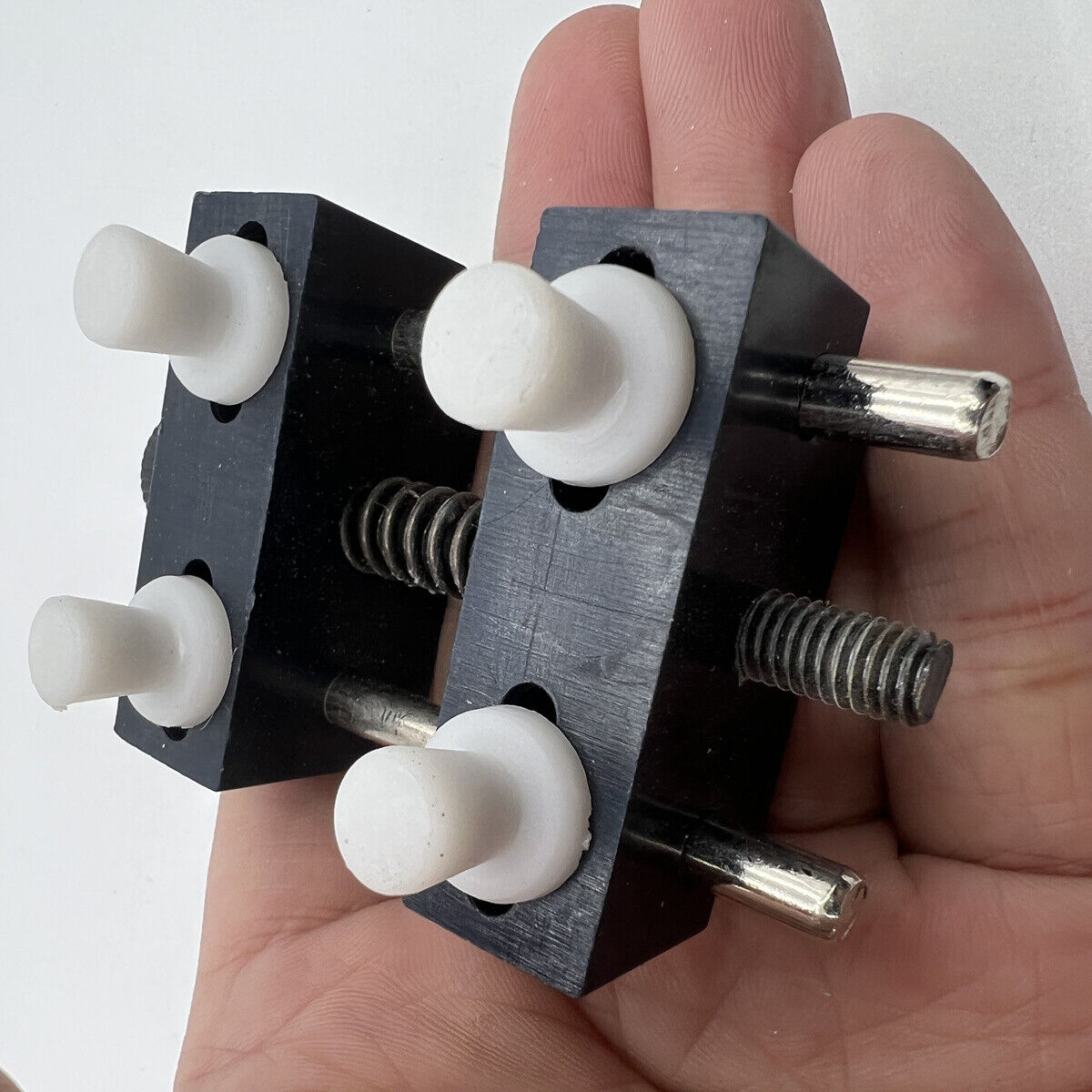 Adjustable watch back case opener, designed for precise removal and secure closing of watch covers.