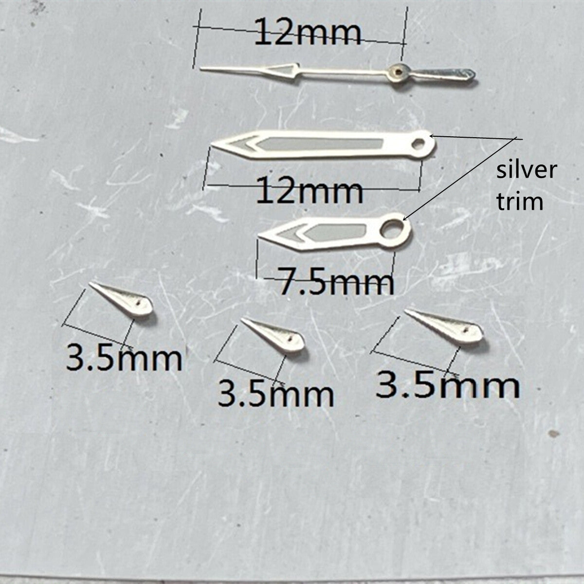 Aiguilles de montre en forme de flèche de 12 mm avec garniture argentée et luminescente verte pour mouvement VD53, VD54 et VD57