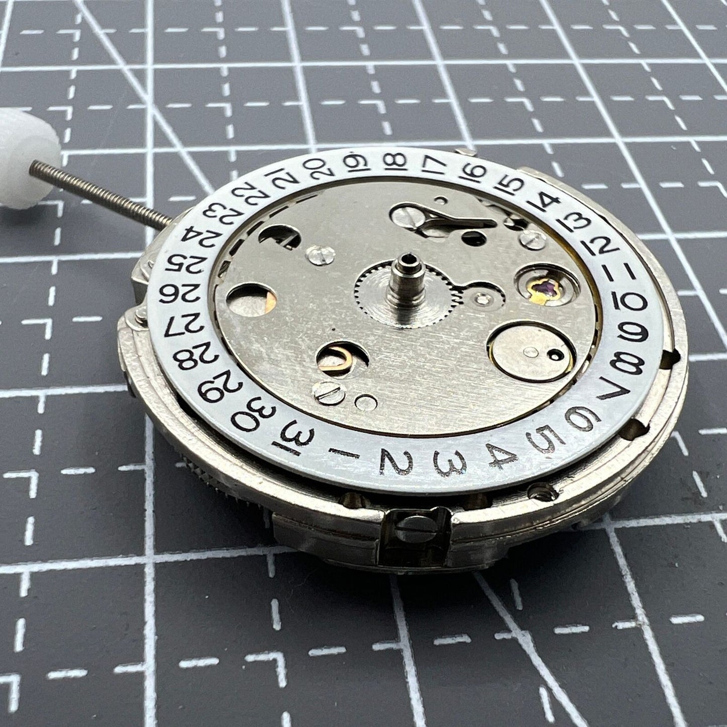 China Made 2813 mechanical watch movement showing single calendar date at 3 o'clock position.