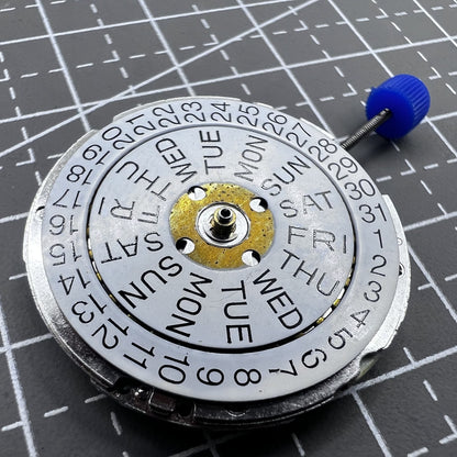 Swiss ISA 1198 quartz watch movement with 3 hands and English day-date display for precise timekeeping.