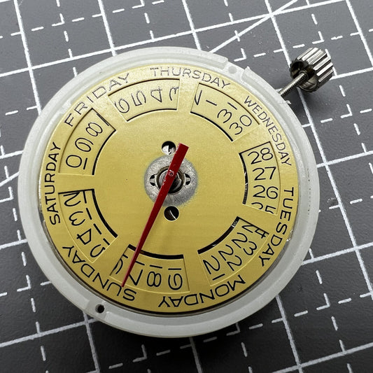 Tianjin Seagull T16 watch with golden dial and day-date display, automatic mechanical movement.