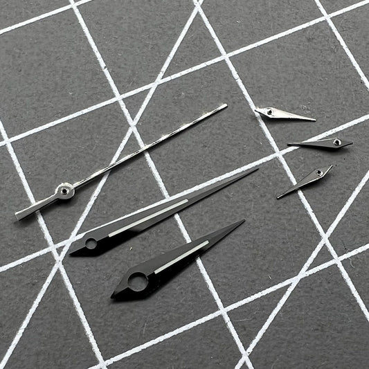 Polished black luminous watch hands for Ronda 5040B quartz movement, enhancing visibility and style.