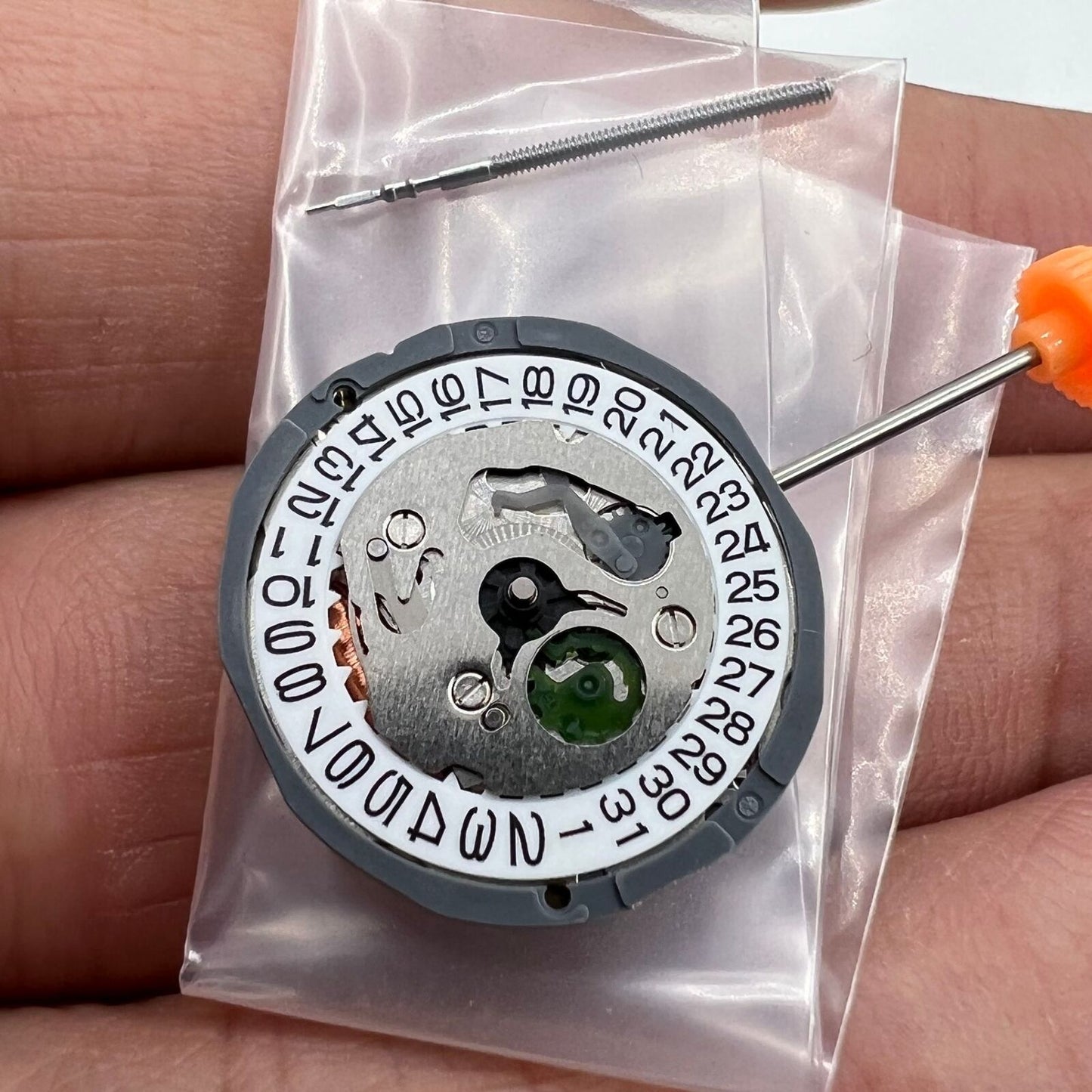 Miyota 1L15 Japan Quartz Movement with date display at 3 o'clock, precision Japan-made mechanism.