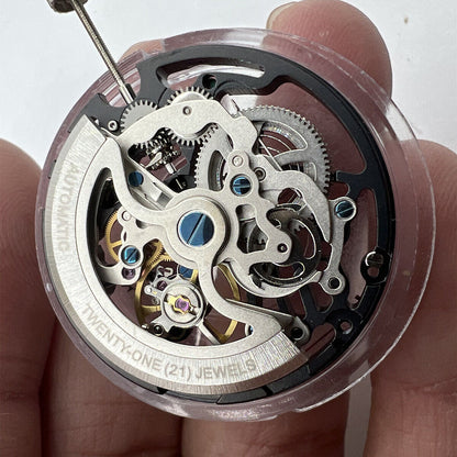 Seagull TY2809 black automatic skeleton watch movement showcasing intricate mechanical design.