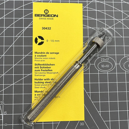 Bergeon 30432 pin vice with slide lock, securely holding drills and broaches for precise watchmaking.