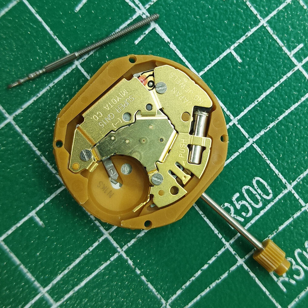 Miyota GN15 quartz watch movement showing date at 6 o'clock, durable Japanese mechanism for precision timekeeping.