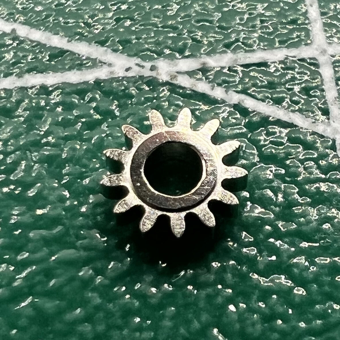 Silver winding pinion gear for ST3600 ETA6497 watch movement, precise replacement part.