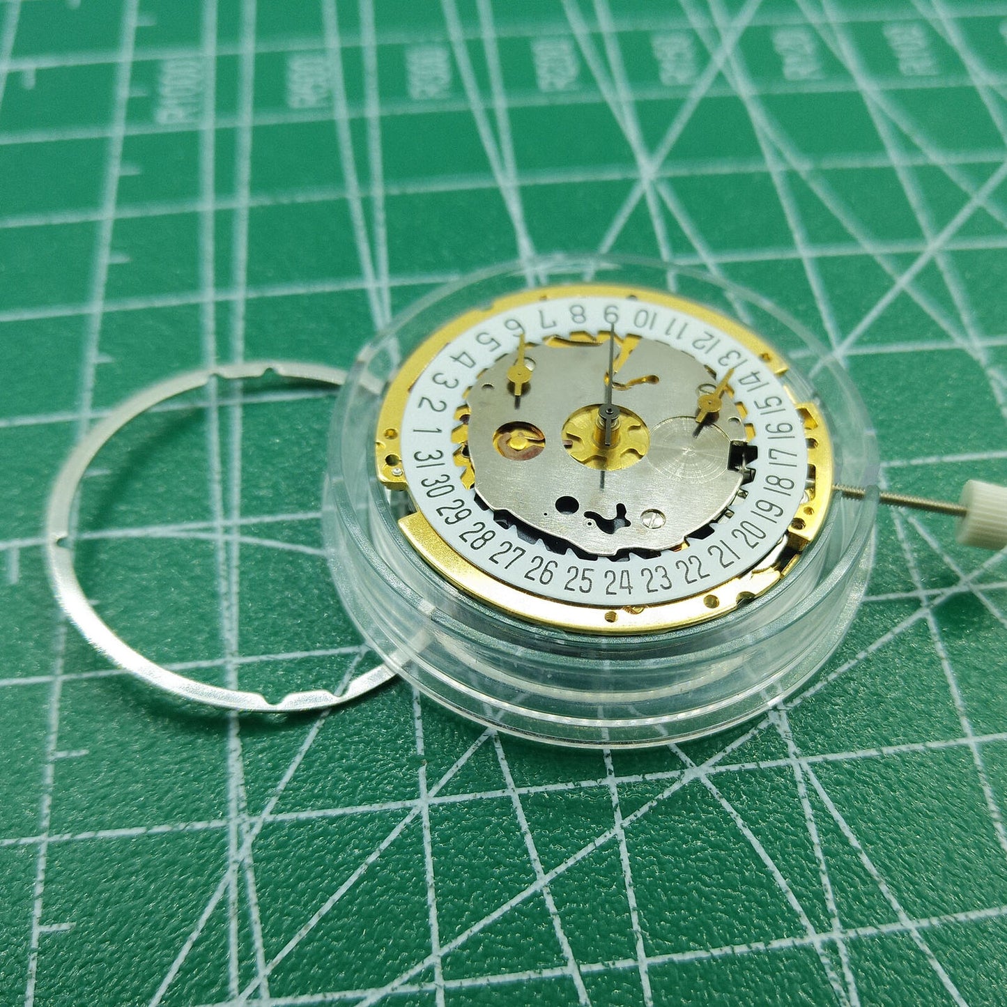 Swiss ISA 8171 quartz watch movement with date at 6, multifunctional for precise timing and reliability.