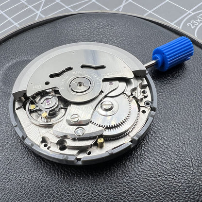 Black NH36A automatic watch movement showcasing the Roman wheel crown at 3 o'clock, precision gear by NH36.