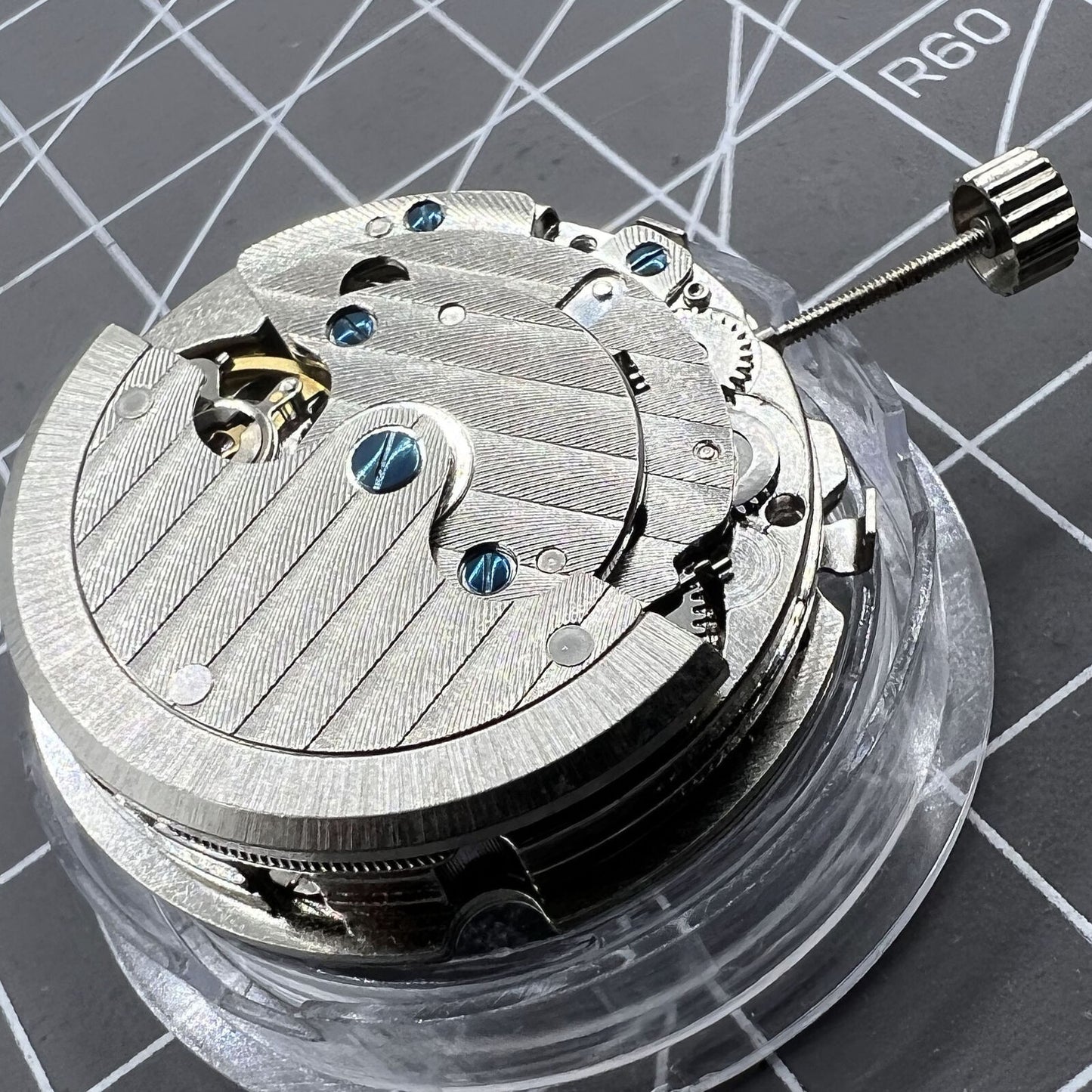 TY2876 T16 watch accessory displaying automatic mechanical movement with small second indicators at each quarter hour.