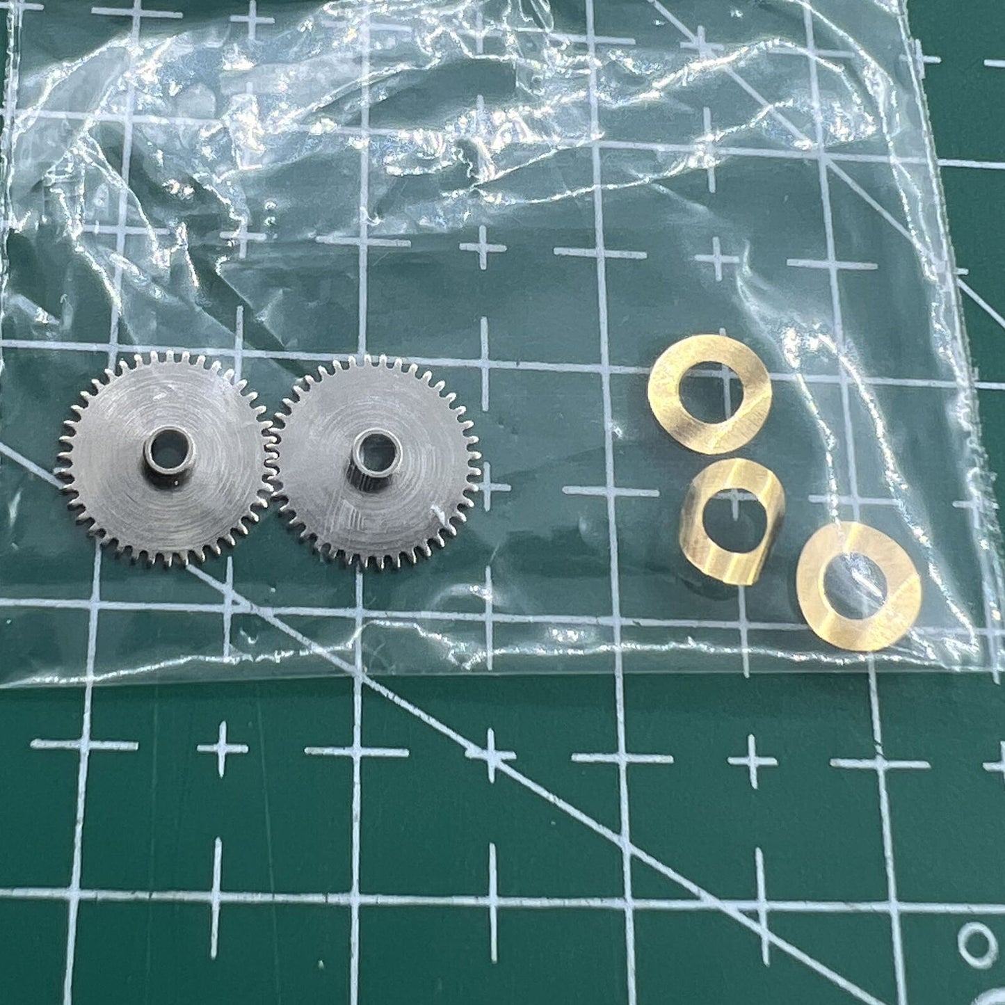 Hour wheel and train bridge compatible with Seagull ST3600 ETA6497 movement for watch repair.