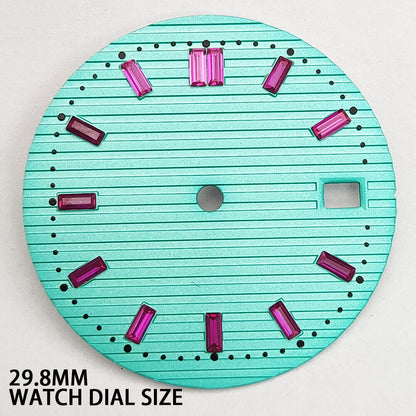 Pink imitation gemstone accent on 29.8mm light green watch dial for NH35 movement.