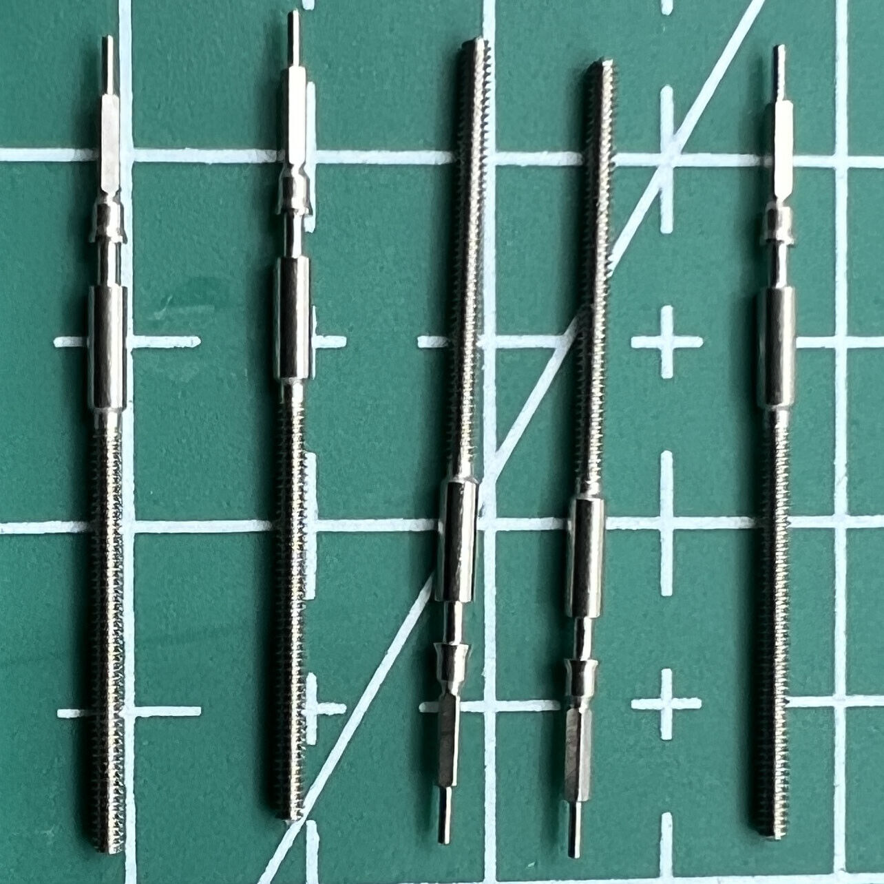 Wholesale set of watch winding stems for Miyota 9015 movement, ideal for precise watch repairs.