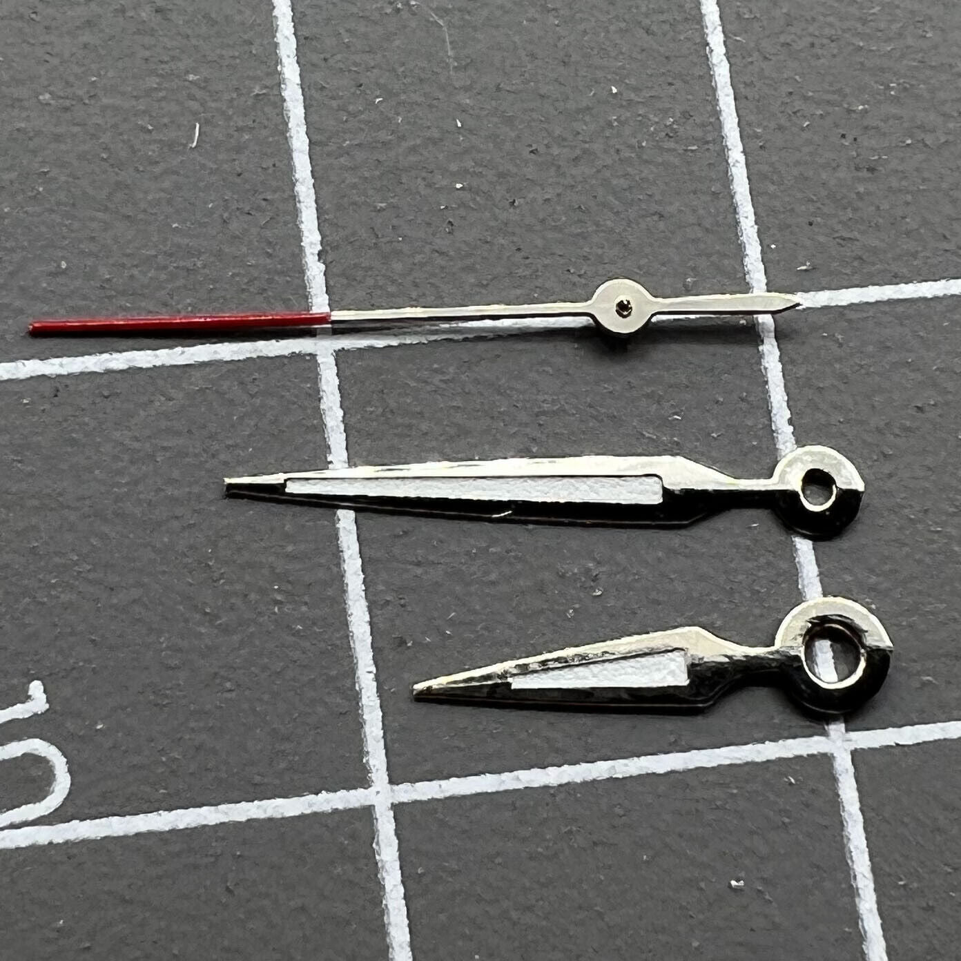 Luminous arrow-shaped watch hands for Miyota 2035 quartz, improving night-time readability.
