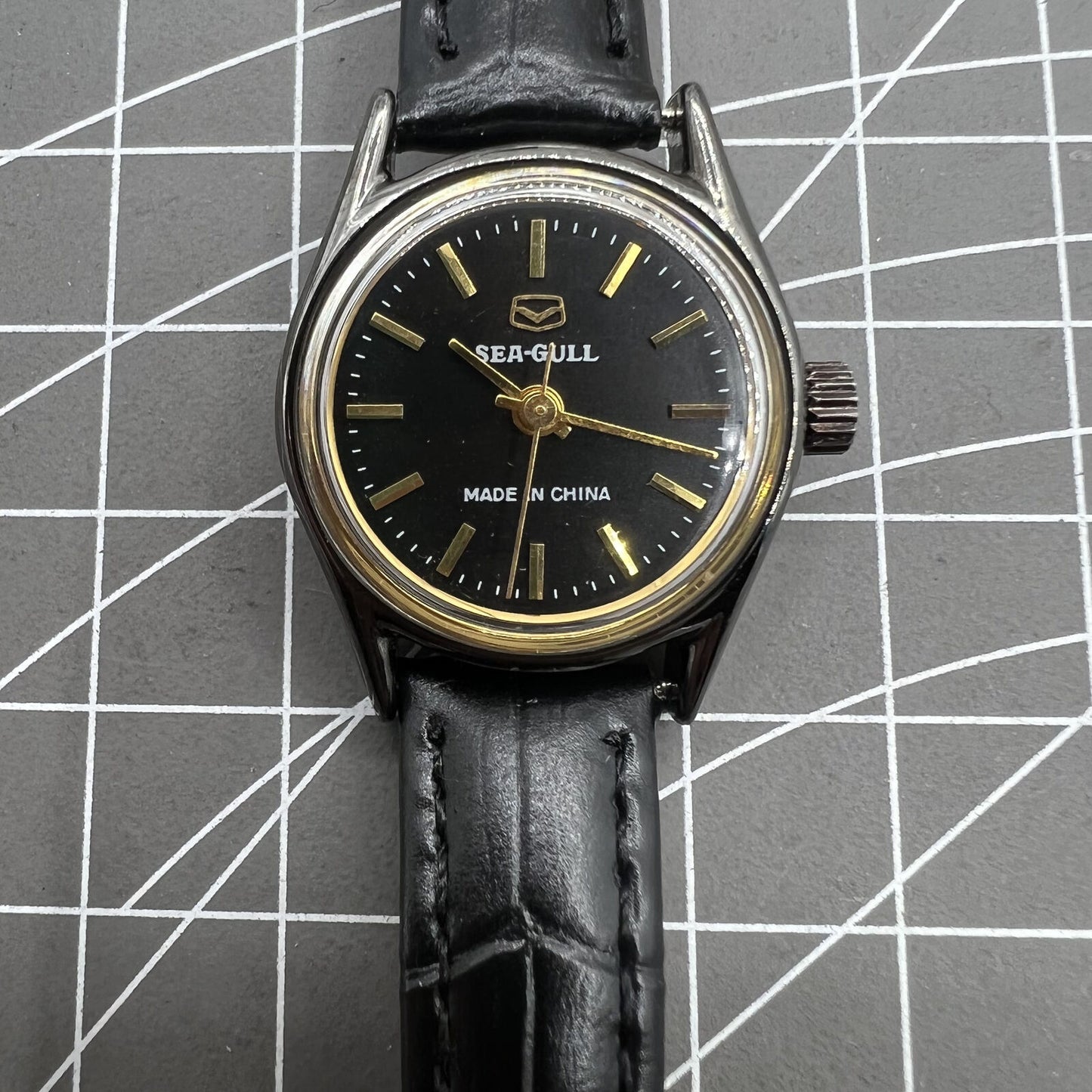 27mm Tianjin Seagull ladies watch with manual movement and gold nail hour markers, elegant design.