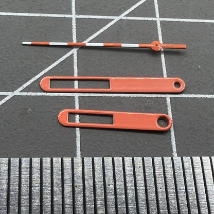 Orange and white watch hands with red trim for Ronda 515 quartz movement, 15mm set.