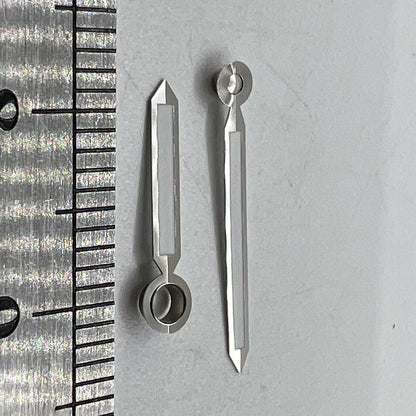 Silver-trimmed green luminous watch hands for ST3600/ST3620, precision accessory for vintage timepieces.