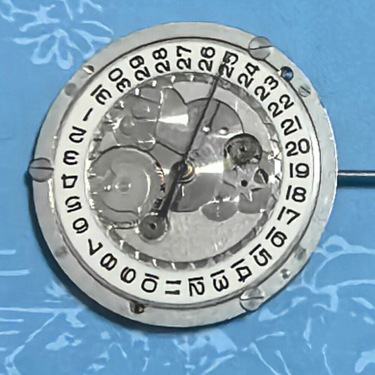 Swiss Made P-2460 quartz watch movement with 3 hands, ideal for precise watch repairs and replacements.