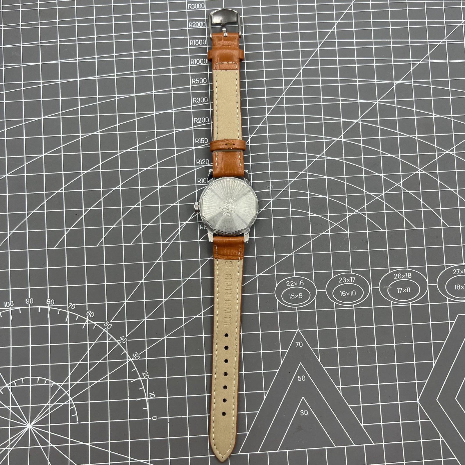 Silver 32mm Shanghai Factory manual mechanical watch with silver case and nail markers, elegant timepiece by Shanghai Factory