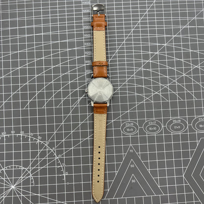 Silver 32mm Shanghai Factory manual mechanical watch with silver case and nail markers, elegant timepiece by Shanghai Factory