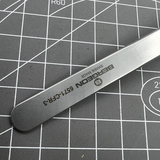Swiss Bergeon 6571-CFR-3 precision tweezers with replaced CFR 3 ends for delicate watch repair tasks.