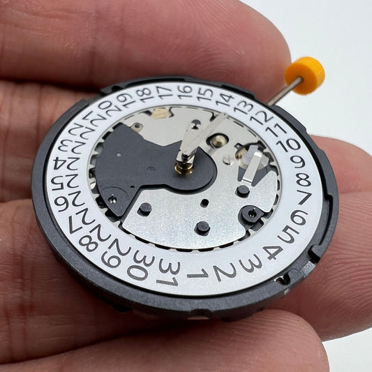 Ronda Z60 Swiss quartz watch movement with small second hand at 6 o'clock, precision craftsmanship.