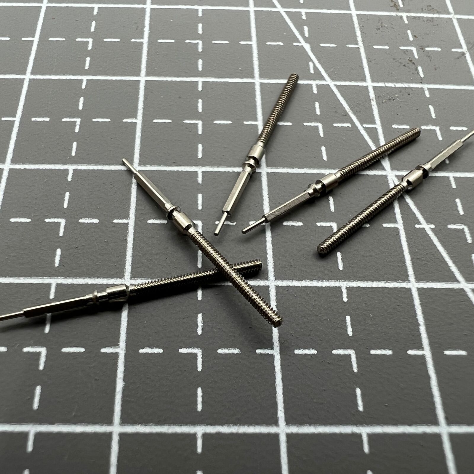 Set of 5 winding stems for China Made ST2555 watches, compatible watch accessory parts pack.