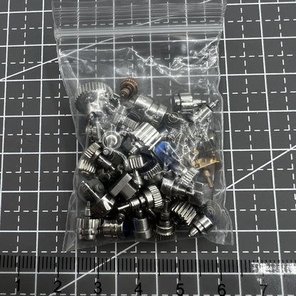 Assorted watch push buttons pack, 50 pieces, perfect for Timex watch repair and replacements.
